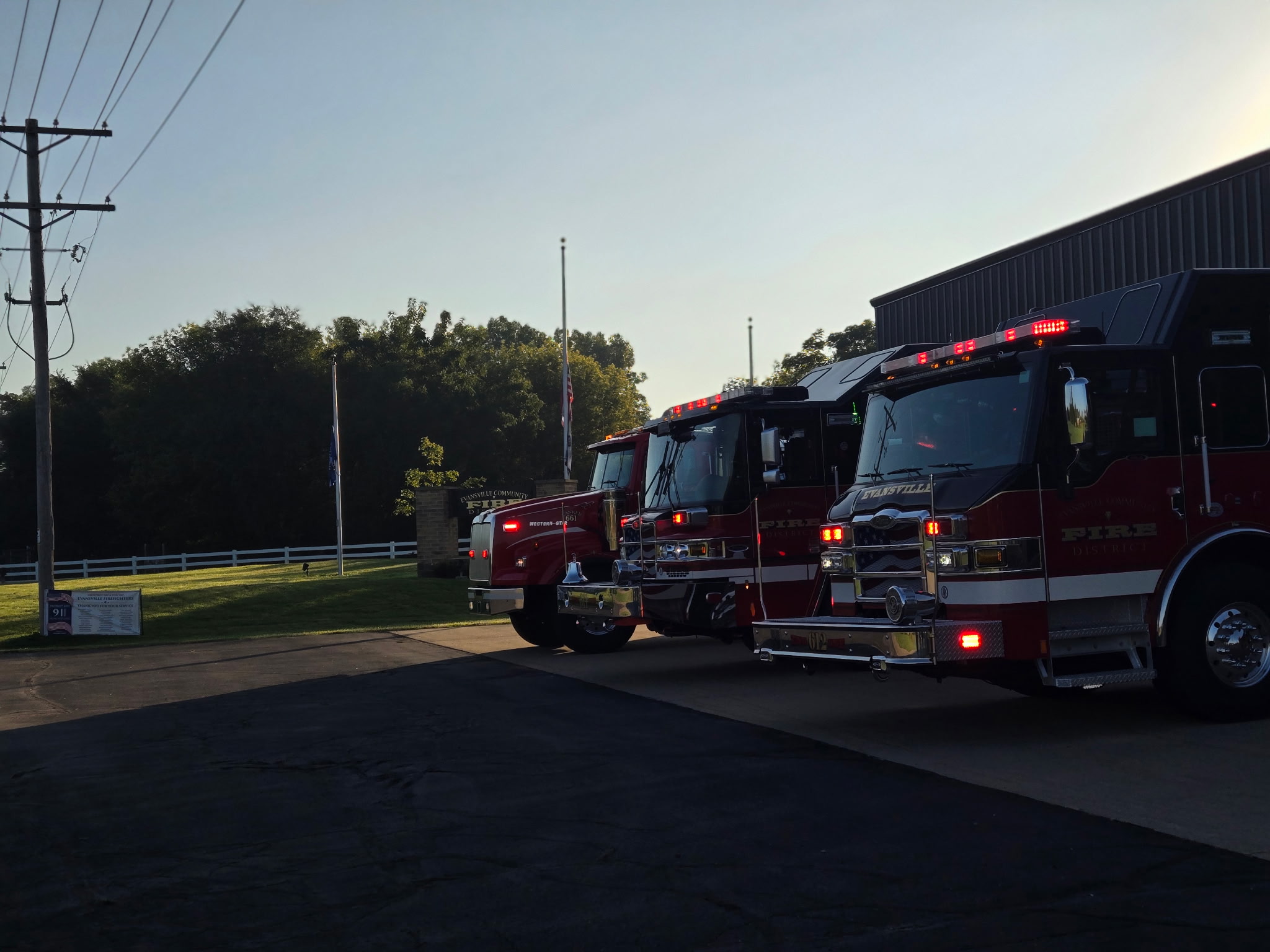 Evansville Fire District apparatus with flag at half-staff for 9/11 tribute